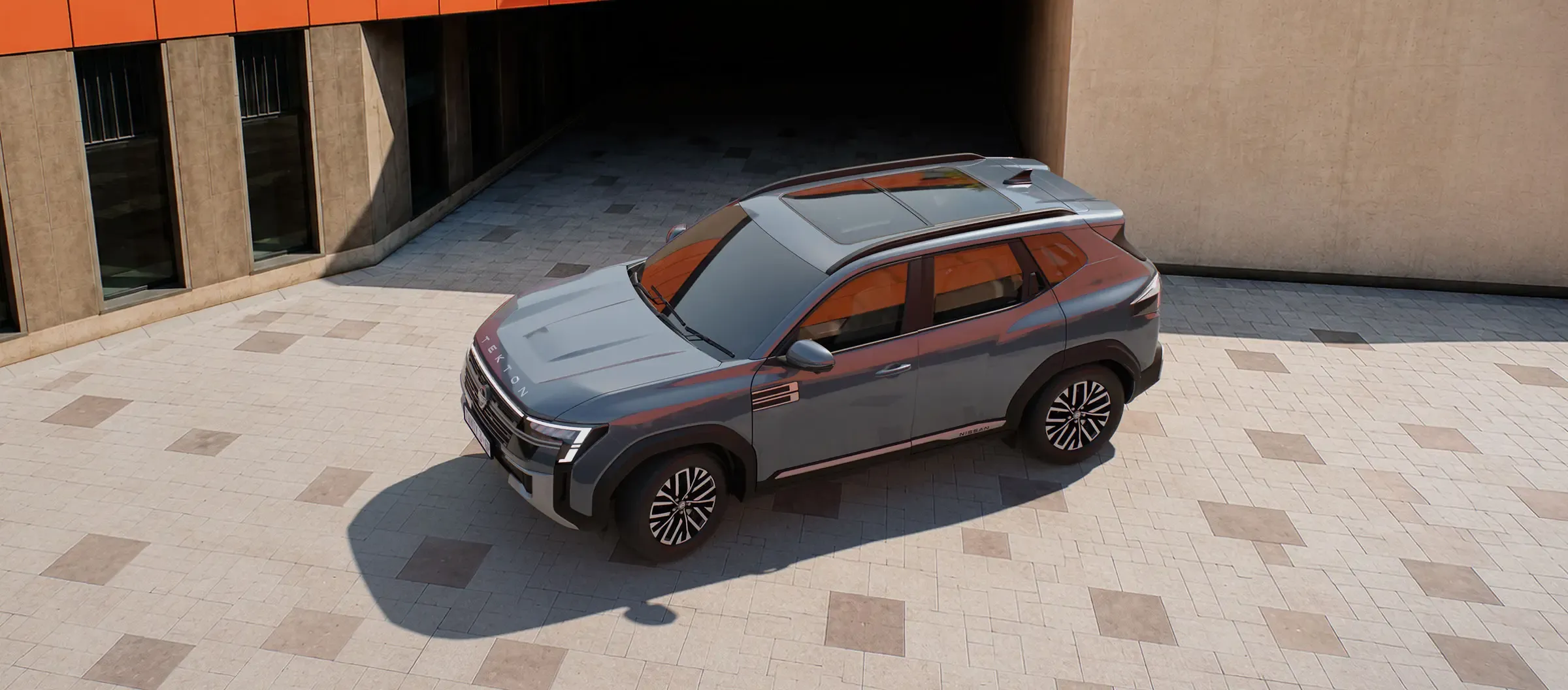 Aerial view of the new Nissan Tekton parked in a paved courtyard