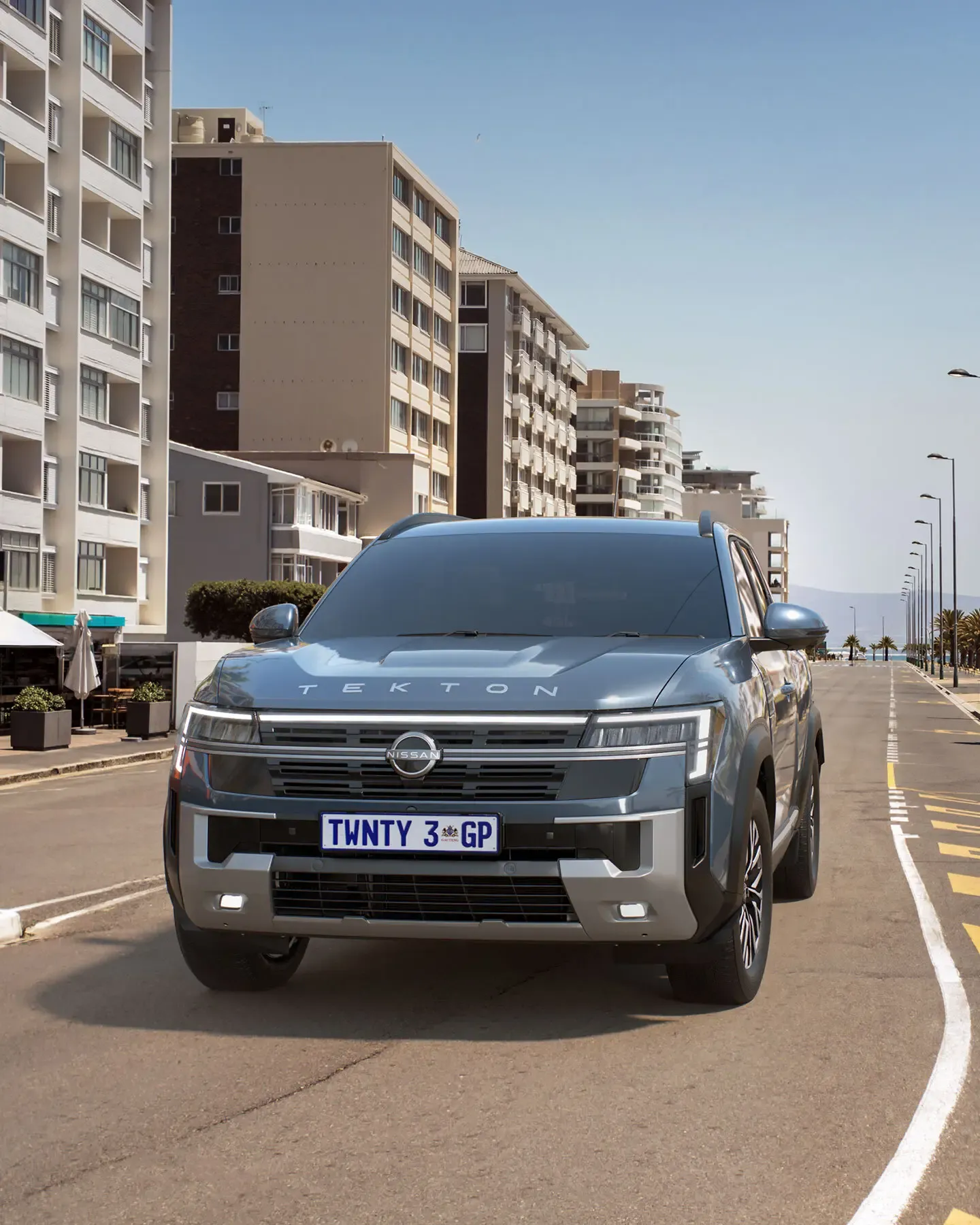 Nissan Tekton front view on a beachfront road