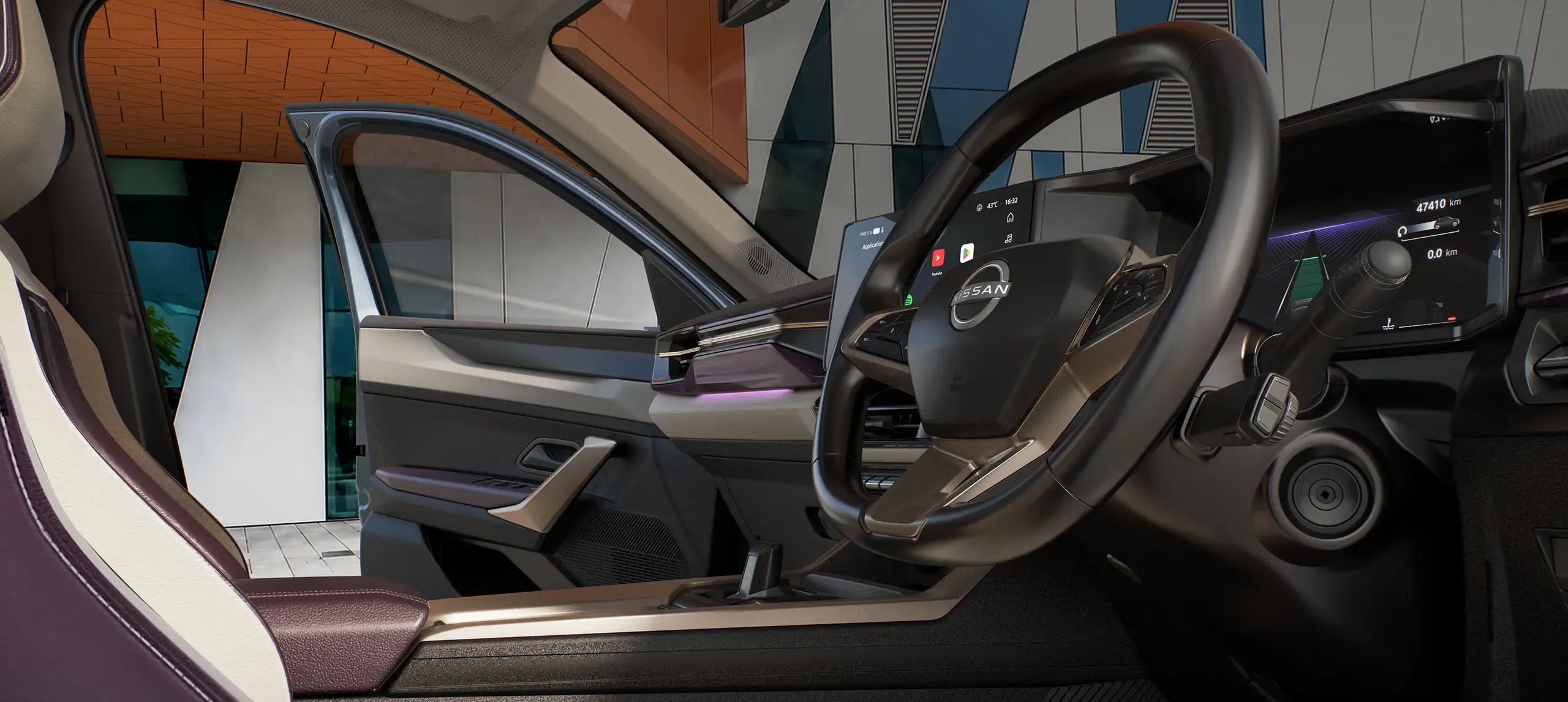 Nissan Tekton dashboard seen through the open driver's door